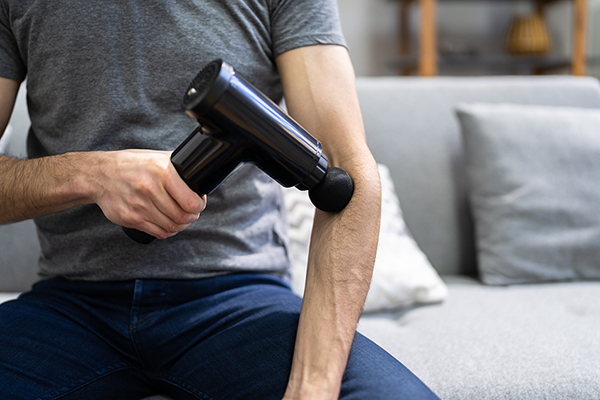Is a percussive therapy device the muscle recovery tool for you? | Parkview  Health