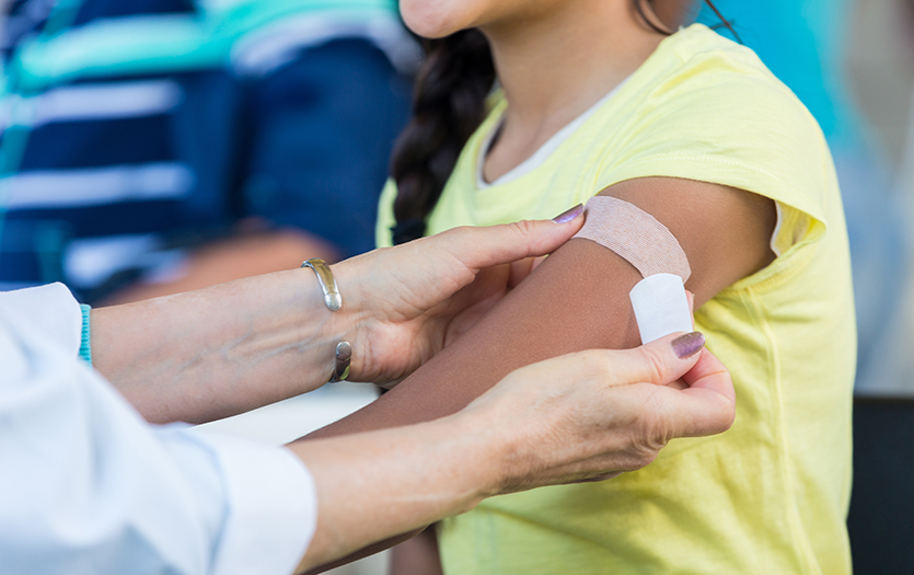 child receiving vaccination