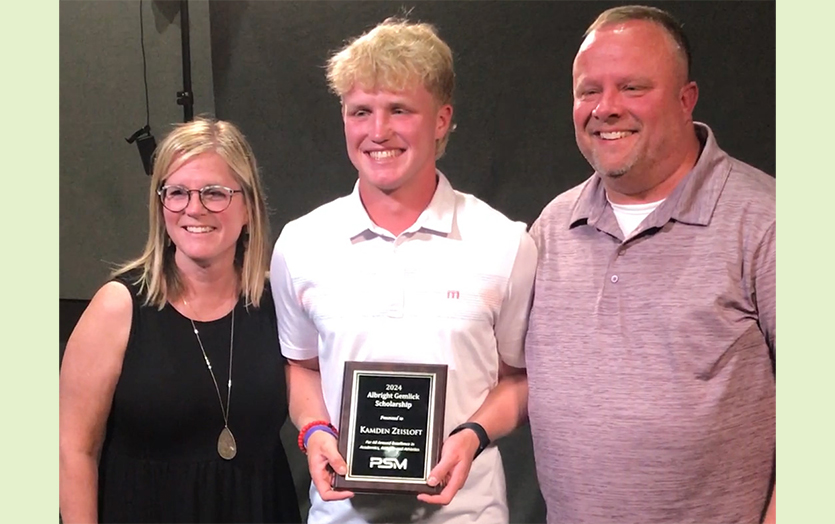 Kamden Zeisloft accepting The Albright Gemlick Excellence Scholarship 