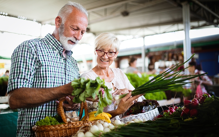 Couple shopping at farmer's market