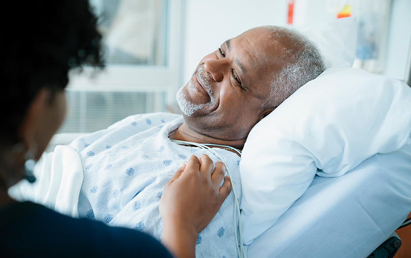 Man in hospital bed