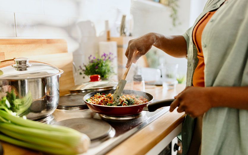 Cooking with pan on stove